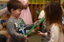 Children at the McChord Child Development Center learn about the importance of dental care as part of National Children’s Dental Health Month Feb. 25, 2016, at Joint Base Lewis-McChord, Wash. Joint Base Lewis-McChord dental staffs traveled to JBLM CDCs and schools to educate youth on oral hygiene techniques, proper diet and more. (U.S. Air Force photo/Staff Sgt. Naomi Shipley)