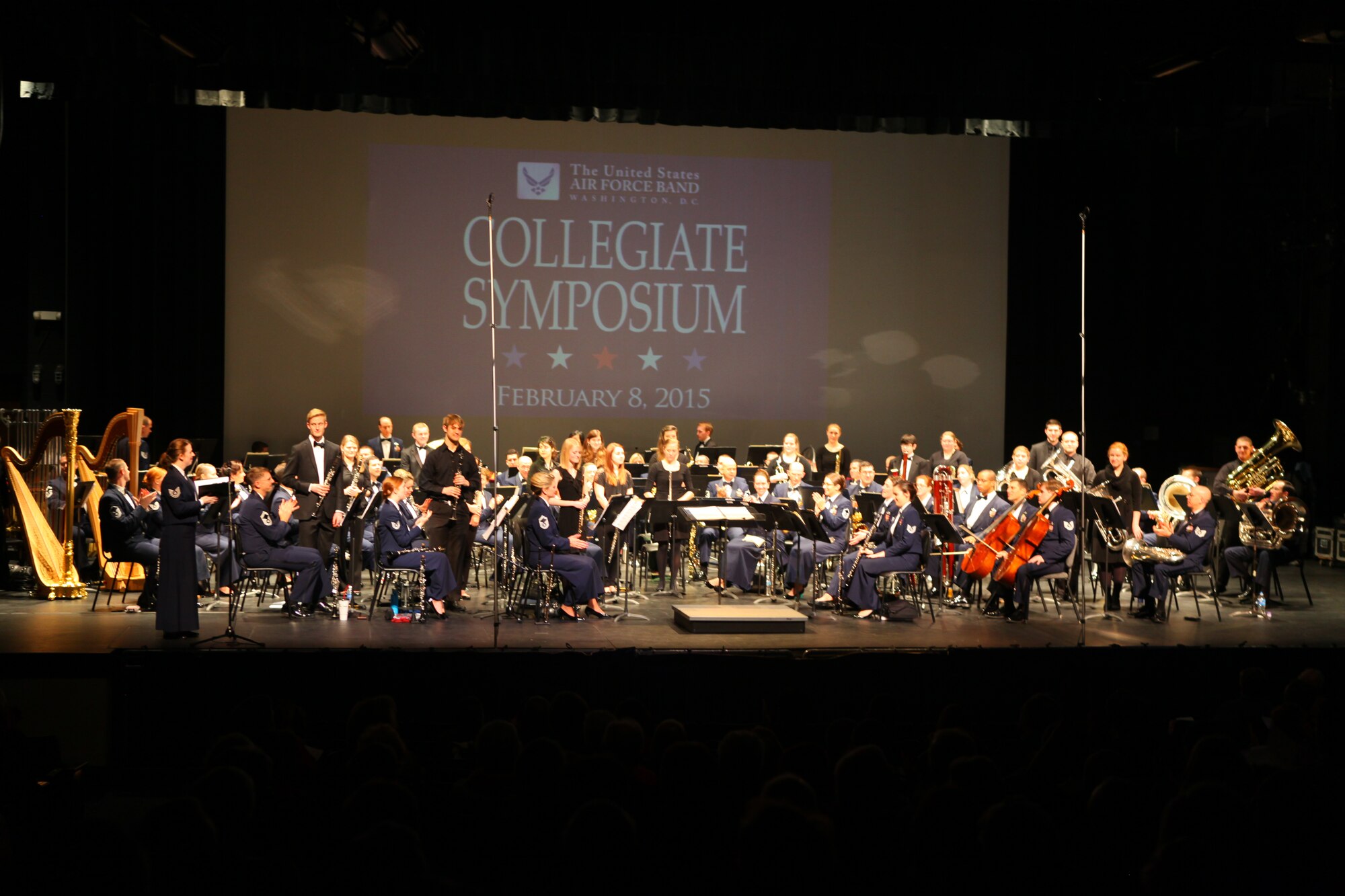 Members of the 2015 Collegiate Symposium are recognized during the final portion of the weekend's activities, a live concert with the Concert Band, given at Bowie Center for the Performing Arts in Bowie, Maryland, February 9, 2015. (U.S. Air Force photo by Technical Sgt. Matthew Shipes/released)