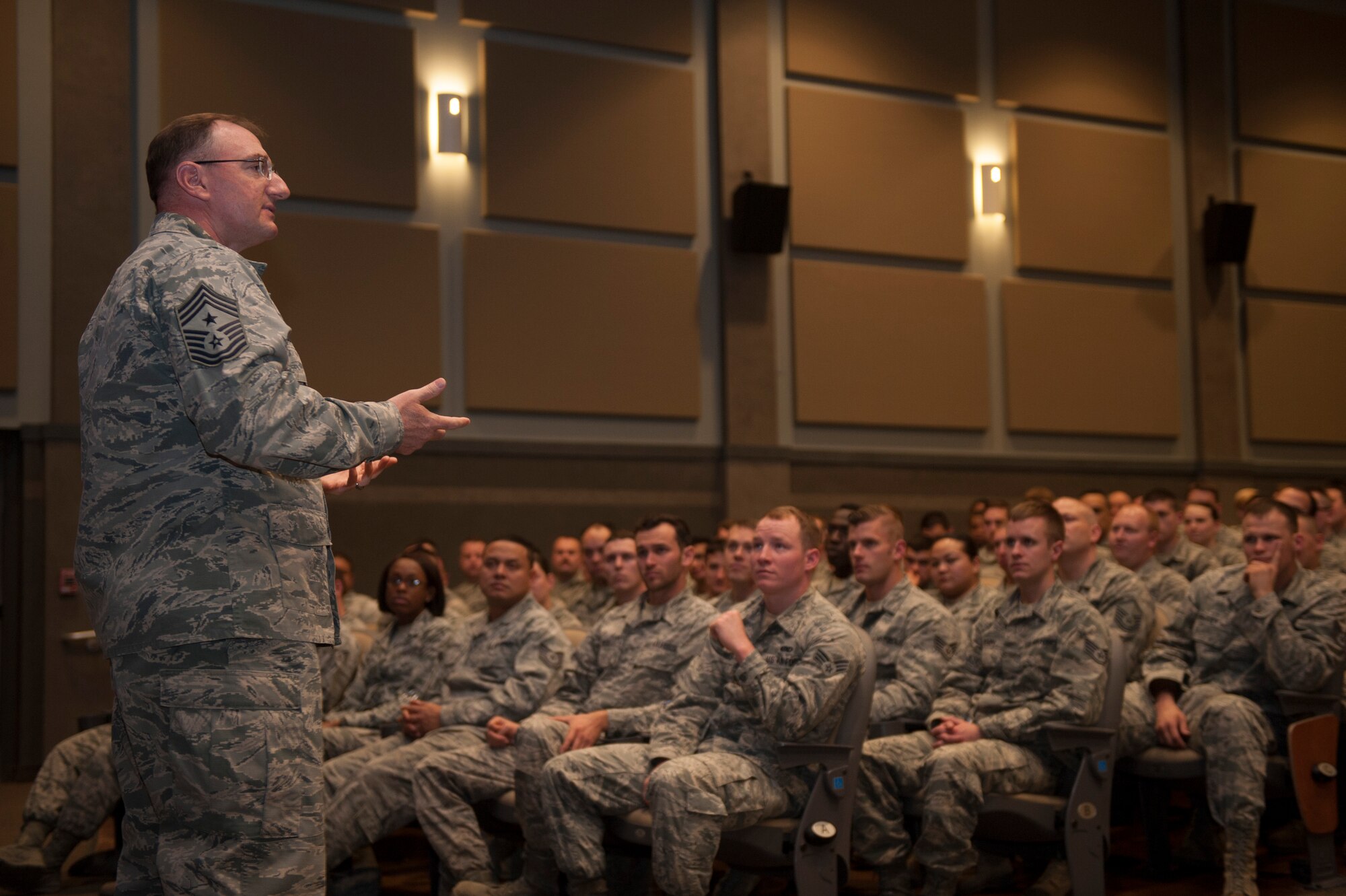 U.S. Air Force Chief Master Sgt. Marty Anderson, 8th Air Force command chief, addresses Airmen during an enlisted all-call Feb.10, 2016, at Dyess Air Force Base, Texas. Airmen were encouraged to ask questions in an open-dialogue with Anderson. (U.S. Air Force photo by Airman Quay Drawdy/ Released)