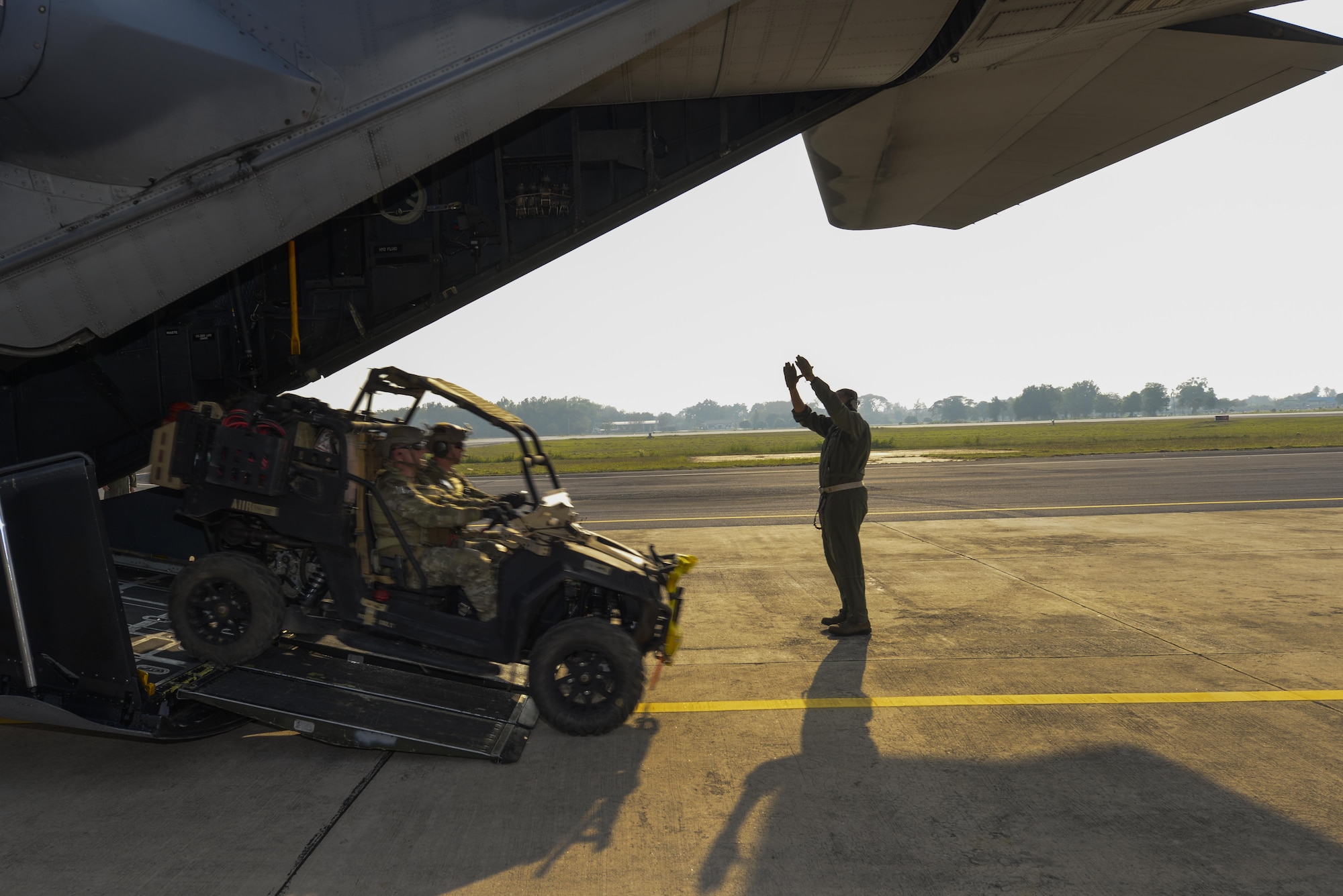 A loadmaster from the 1st Special Operations Squadron executes the infiltration of Thai and U.S. Army special Forces during exercise Cobra Gold, Feb. 10, 2016, Udon Thani, Thailand. Cobra Gold increases cooperation, interoperability and collaboration among partner nations in order to achieve effective solutions to common challenges. (U.S. Air Force photo by Senior Airman Stephen G. Eigel)