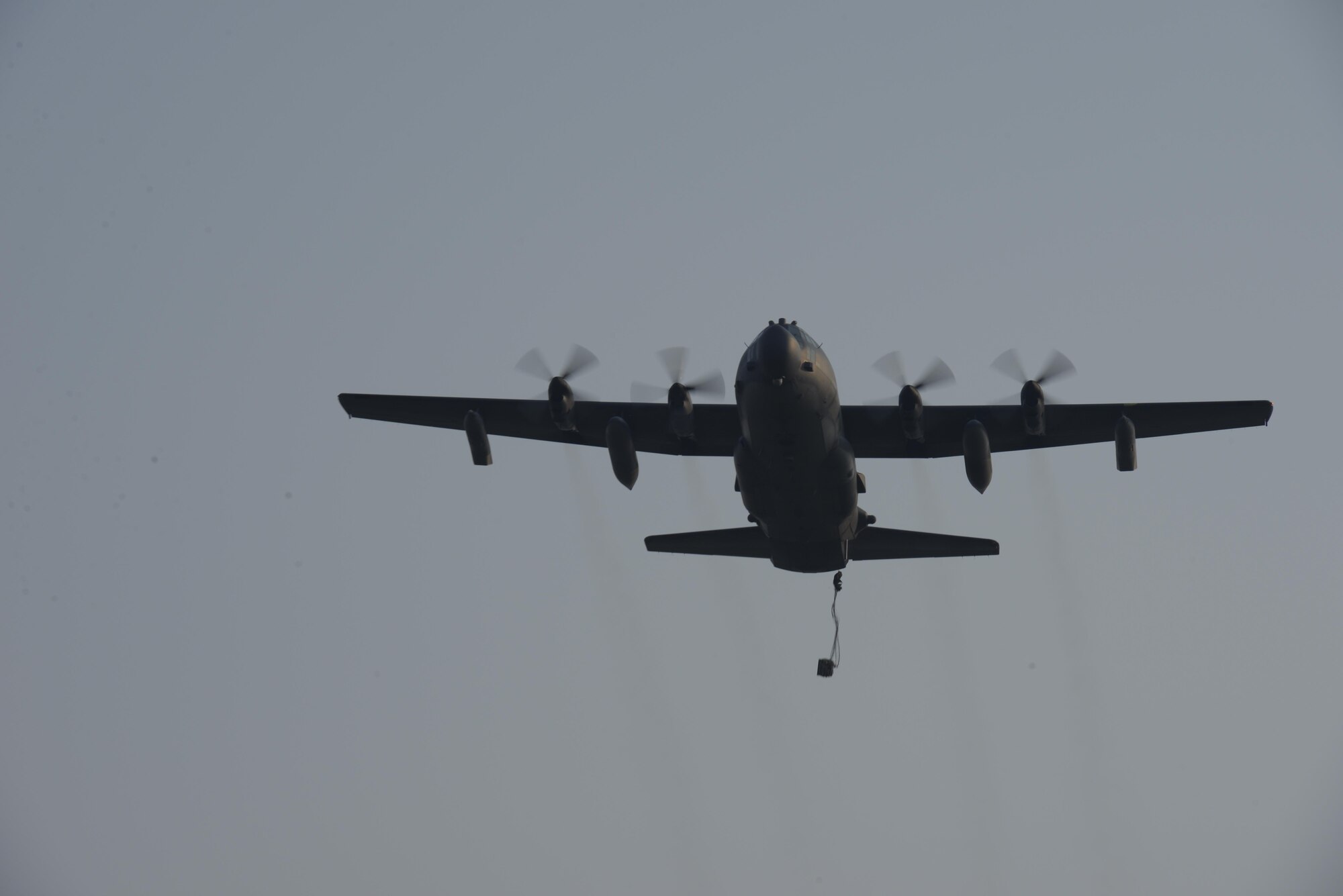 An MC-130H from the 1st Special Operations Squadron executes a high speed drop during exercise Cobra Gold, Nam Phong, Thailand, Feb. 12, 2014. Cobra Gold is the largest multilateral exercise in the Indo-Asia-Pacific region and is an integral part of the U.S. commitment to strengthen engagement in the region. (U.S. Air Force photo by Senior Airman Stephen G. Eigel)