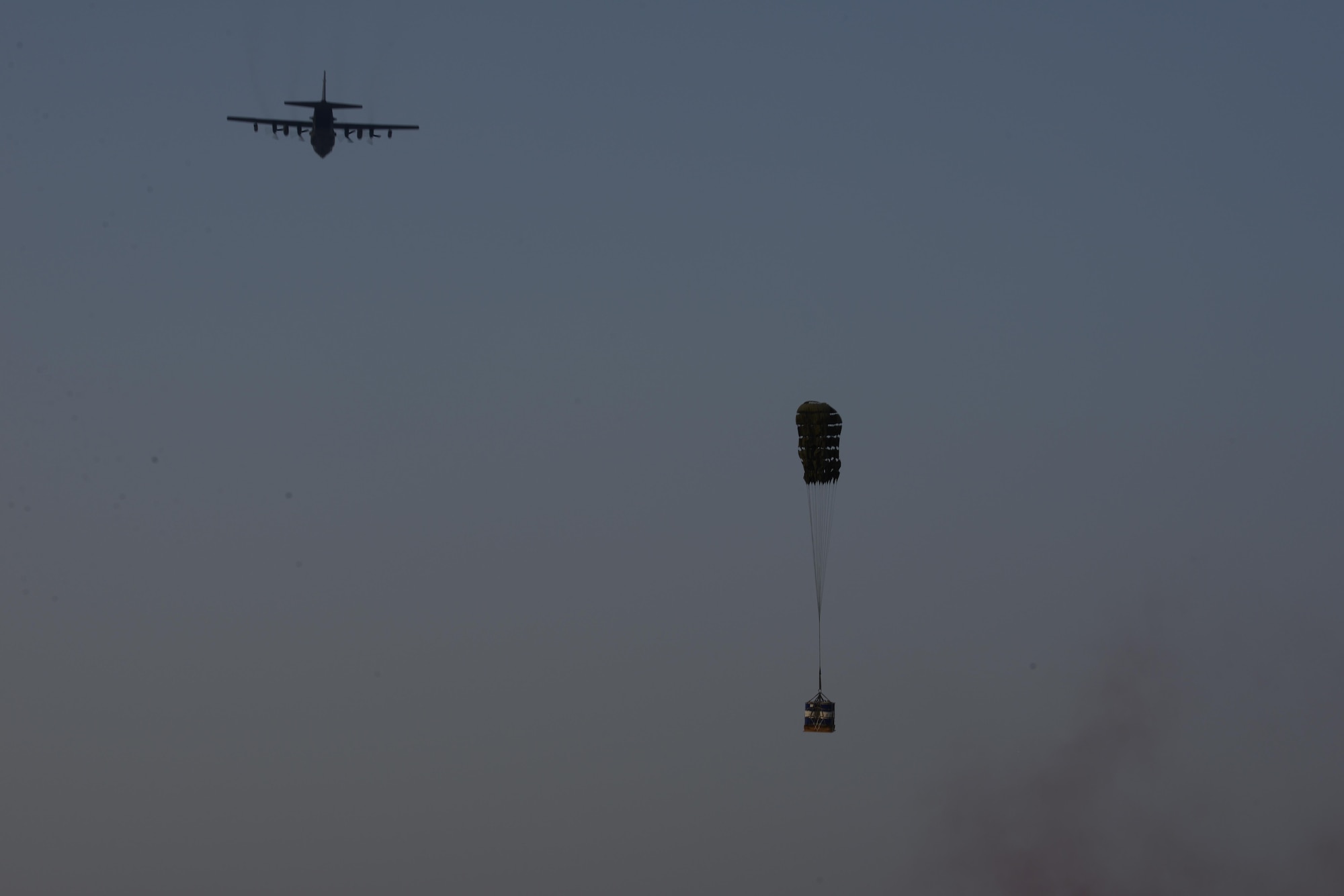 An MC-130H from the 1st Special Operations Squadron executes a high speed drop during exercise Cobra Gold, Nam Phong, Thailand, Feb. 12, 2014. Cobra Gold 16 increased cooperation, interoperability and collaboration among partner nations in order to achieve effective solutions to common challenges. (U.S. Air Force photo by Senior Airman Stephen G. Eigel) 
