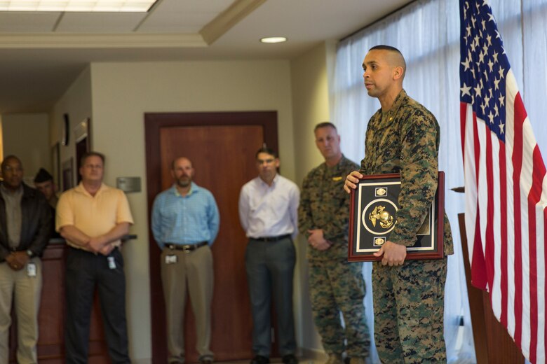 Maj. Eduardo Pinales speaks to Marines after receiving federal accreditation aboard Marine Corps Air Station Beaufort Feb. 18. In order to be eligible for accreditation the Provost Marshal’s Office had to meet or exceed the specified curriculum, which is comprised of a series of basic criteria drafted from accreditation programs of larger municipal police forces. Pinales is the Provost Marshal for MCAS Beaufort.