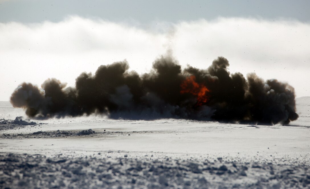 C-4 explodes in Rena, Norway, Feb. 22, 2016. Marines with 2nd Explosive Ordnance Disposal Company, Combat Logistics Battalion 252 tested the effects of various amounts of C-4 in snow in preparation for Exercise Cold Response 2016. The exercise will include 12 NATO allies and partner nations, and approximately 16,000 troops. Marines will train alongside Norwegian EOD specialists to see how they operate in order to become more proficient at working with each other in the future.