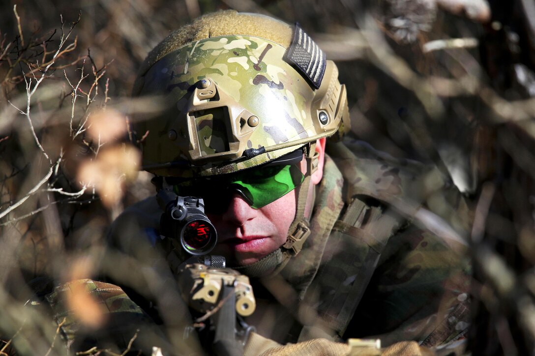 Air Force Senior Airman Josh Derins secures an observation post during Exercise Eagle Eye at Warren Grove Gunnery Range, N.J., Feb. 18, 2016. Derins is a tactical air control party airman assigned to the 227th Air Support Operation Squadron. New Jersey Air National Guard photo by Tech. Sgt. Matt Hecht