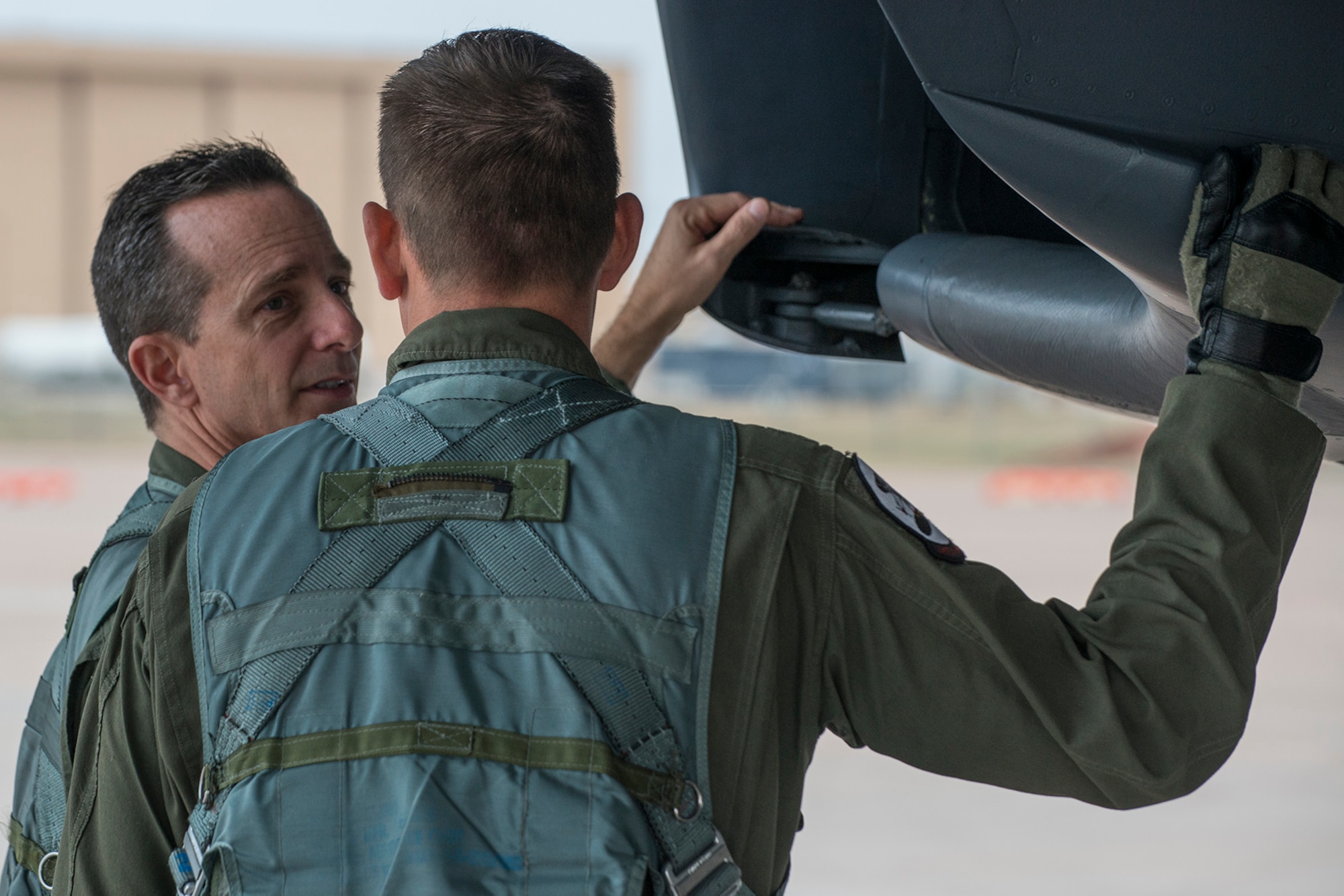 U.S. Air Force Col. Denis Heinz, a weapons systems officer, performs a preflight inspection of a B-1 Lancer prior to a mission on Feb. 20, 2016, Dyess Air Force Base (AFB), Texas. Heinz is Commander of the Air Force Reserve Command’s 489th Bomb Group at Dyess, which is assigned under the 307th Bomb Wing at Barksdale AFB, La. (U.S. Air Force photo by Master Sgt. Greg Steele/Released)