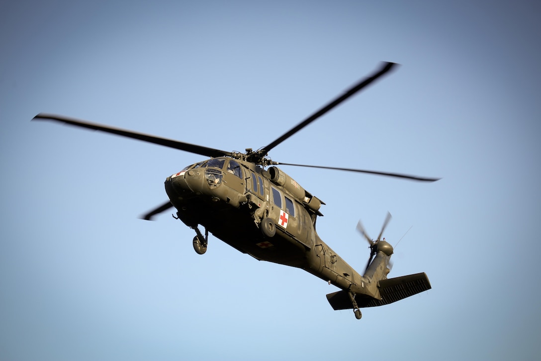 A UH-60 Black Hawk helicopter flies into a landing zone for a casualty evacuation during Exercise Eagle Eye at Warren Grove Gunnery Range, N.J., Feb. 18, 2016. The helicopter crew is assigned to the New Jersey Army National Guard's 1st Battalion, 150th Assault Helicopter Battalion. New Jersey Air National Guard photo by Tech. Sgt. Matt Hecht