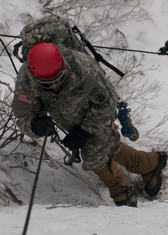 Air Force Maj. Gen. Steven Cray, the adjutant general of the Vermont National Guard, climbs the mountain at Smugglers' Notch, in Jeffersonville, Vt., Feb. 18, 2016. Vermont Army National Guard photo by Spc. Avery Cunningham