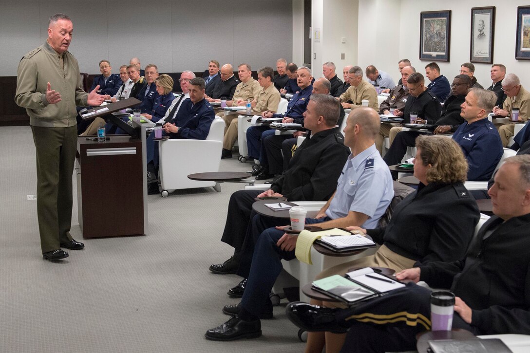 Marine Corps Gen. Joseph F. Dunford Jr., chairman of the Joint Chiefs of Staff, speaks to students and spouses taking a National Defense University Capstone course on Fort McNair in Washington, D.C., Feb. 26, 2016. Navy photo by Petty Officer 2nd Class Dominique Pineiro