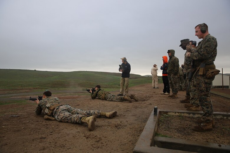 Marines test the Autonomous Robotic Human Type Target Feb. 18, at Camp Pendleton. The targets offer a new aspect of movement in unpredictable directions on unknown distance ranges. The Marines firing at the targets were chosen from Division Schools, 1st Marine Division, so they could assess how the target could be implemented into their training. (U.S. Marine Corps Photo by Cpl. John Baker)