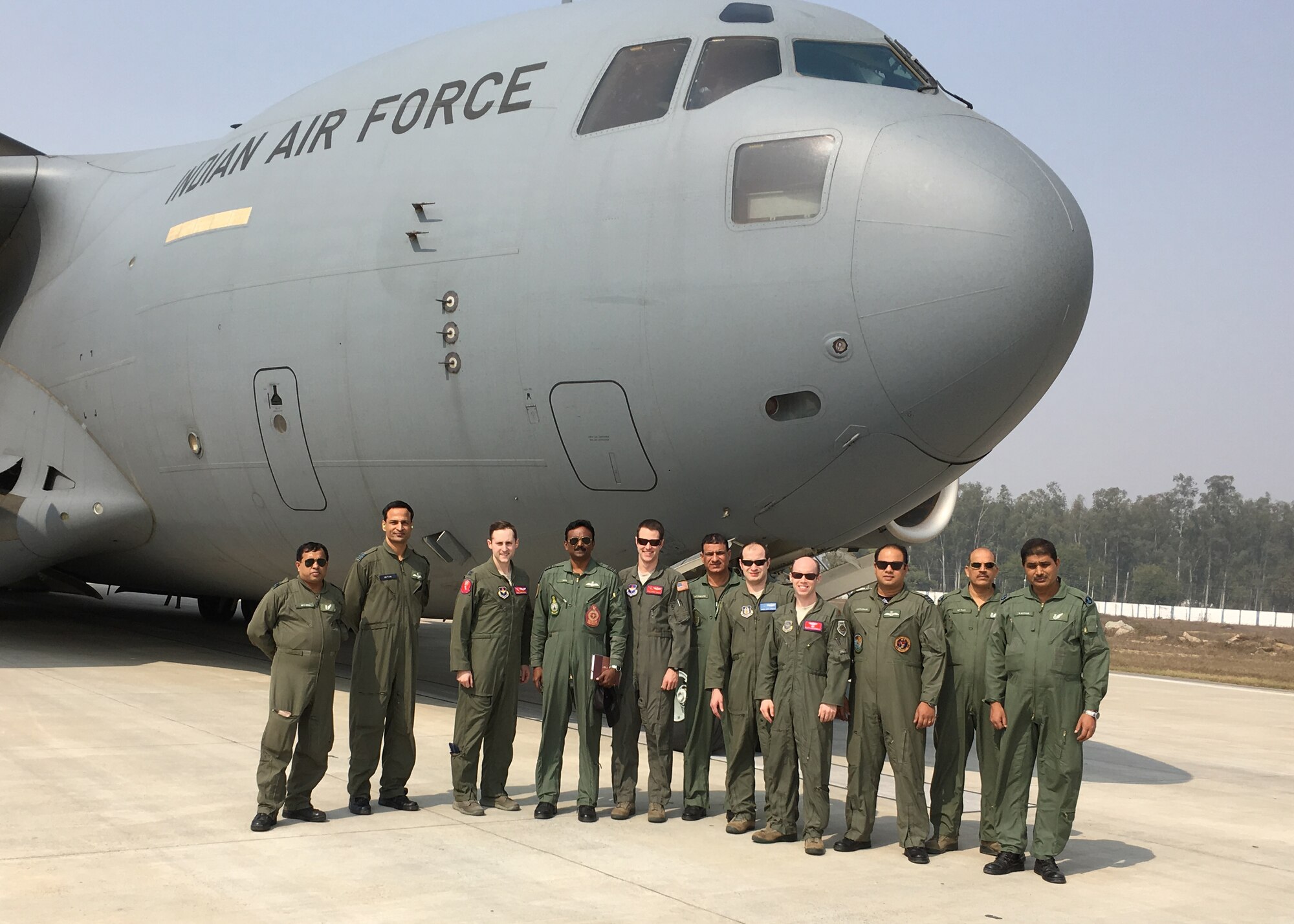 U.S. and Indian Airmen team up for training on several personnel airdrop missions, at Agra Air Force Station, India, Feb. 12, 2016. U.S. Air Force C-17 Globemaster III cargo aircraft crews from Altus Air Force Base and Joint Base Lewis-McChord spent two weeks in India training pilots and loadmasters and certifying them on airdrops. (U.S. Air Force photo courtesy photo/Released)