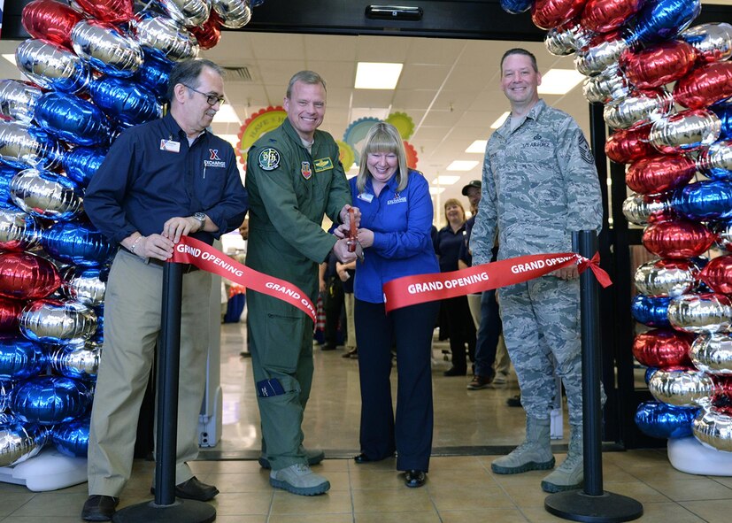 Beale leadership and Exchange management cut the ribbon during the grand re-opening of the newly renovated Base Exchange Feb. 25, 2016, Beale Air Force Base, California. The remodeling project cost approximate$1.9 million, which includes new flooring, a floor plan to accommodate an expanded product line, new displays, and a new central checkout location. (U.S. Air Force photo by Robert Scott)