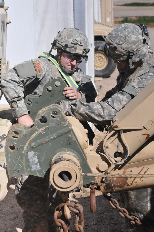 Spc. Elijah Andrews, a wheeled vehicle mechanic with the 103rd Quartermaster Company and a Bellingham, Wash., native, readies a vehicle for towing Feb. 18 at Fort Polk, La. Mechanics of the 103rd Quartermaster Company, an Army Reserve unit from Houston and many other units from around the U.S. have been working together during the Joint Readiness Training Center's rotation 16-04 operation. The units have come together during the exercise to provide maintenance support for the 4th Brigade Combat Team (Airborne). (U.S. Army Photo by Sgt. Aaron Ellerman 204th Public Affairs Detachment/Released)