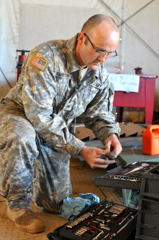 Sgt. Jesse Bankston, a wheeled vehicle mechanic for 103rd Quartermaster Company and Houston, Texas, native, grabs a pair of pliers from his toolbox Feb. 18 at Fort Polk, La. Mechanics of the 103rd Quartermaster Company, an Army Reserve unit from Houston, Texas, and many other units from around the U.S. have been working together during the Joint Readiness Training Centers’ rotation 16-04 operation. The units have come together during the exercise to provide maintenance support for the 4th Brigade Combat Team (Airborne). (U.S. Army Photo by Sgt. Aaron Ellerman 204th Public Affairs Detachment/Released)