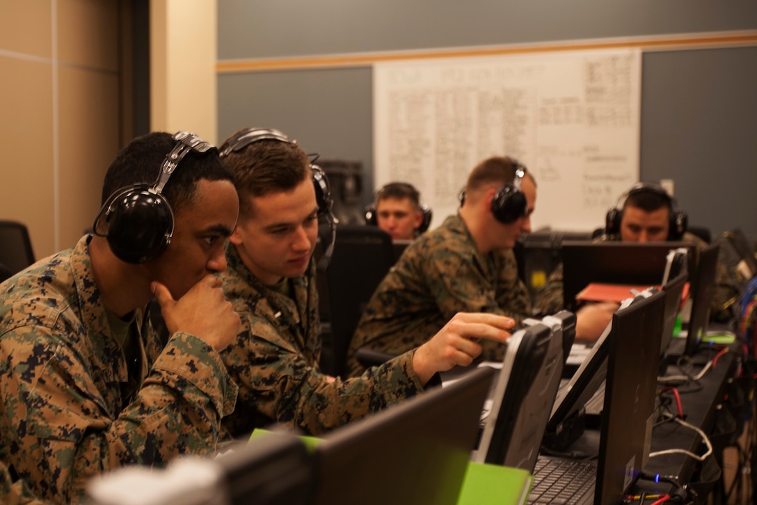 Marines with Marine Air Support Squadron 1 participate in Direct Air Support Center and Tactical Air Command Center Drill 3-16 at Marine Corps Air Station Cherry Point, N.C., Feb. 16, 2016. During the drill, Marines assessed and shaped MASS-1’s new Battle Lab application as continuity of operations for the Wing Operations Center. The Battle Lab is capable of providing a dedicated, continuous training system for MASS-1 and Marine Air Command Group 28 that will enable integration between fellow Marine Air Command and Control System agencies. (U.S. Marine Corps photo by Pfc. Nicholas P. Baird/Released) 