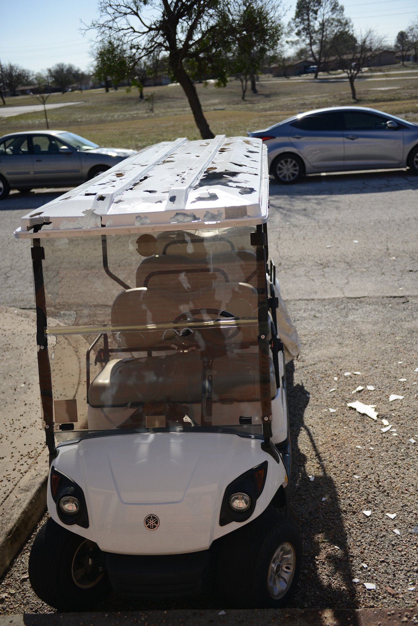 A storm containing 60 plus mph winds and golf ball sized hail hit Laughlin Air Force Base, Texas, at approximately 10:30 p.m. Feb. 22, 2016. With the storm came damaged facilities, housing units and personal property, to include hundreds of dented cars and homes. (U.S. Air Force photo by Senior Airman Jimmie D. Pike)