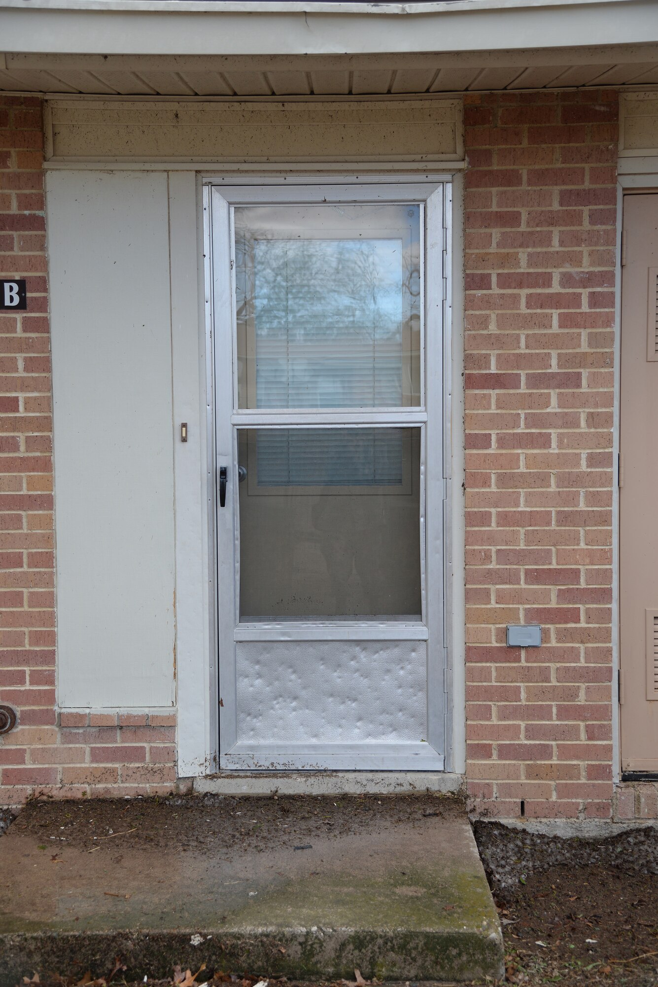A storm containing 60 plus mph winds and golf ball sized hail hit Laughlin Air Force Base, Texas, at approximately 10:30 p.m. Feb. 22, 2016. With the storm came damaged facilities, housing units and personal property, to include hundreds of dented cars and homes. (U.S. Air Force photo by 1st Lt. H. Isabel Crump)