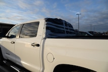 A storm containing 60 plus mph winds and golf ball sized hail hit Laughlin Air Force Base, Texas, at approximately 10:30 p.m. Feb. 22, 2016. With the storm came damaged facilities, housing units and personal property, to include hundreds of dented cars and homes. (U.S. Air Force photo by 1st Lt. H. Isabel Crump)