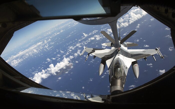 An 18th Aggressor Squadron F-16C Fighting Falcon connects to a 909th Air Refueling Squadron KC-135 Stratotanker for aerial refueling during the large force employment of exercise Cope North 16, Feb. 24, 2016, at Andersen Air Force Base, Guam. Through training exercises such as CN16, the U.S., Japan and Australian air forces develop combat capabilities, enhancing air superiority, electronic warfare, air interdiction, tactical airlift and aerial refueling. 