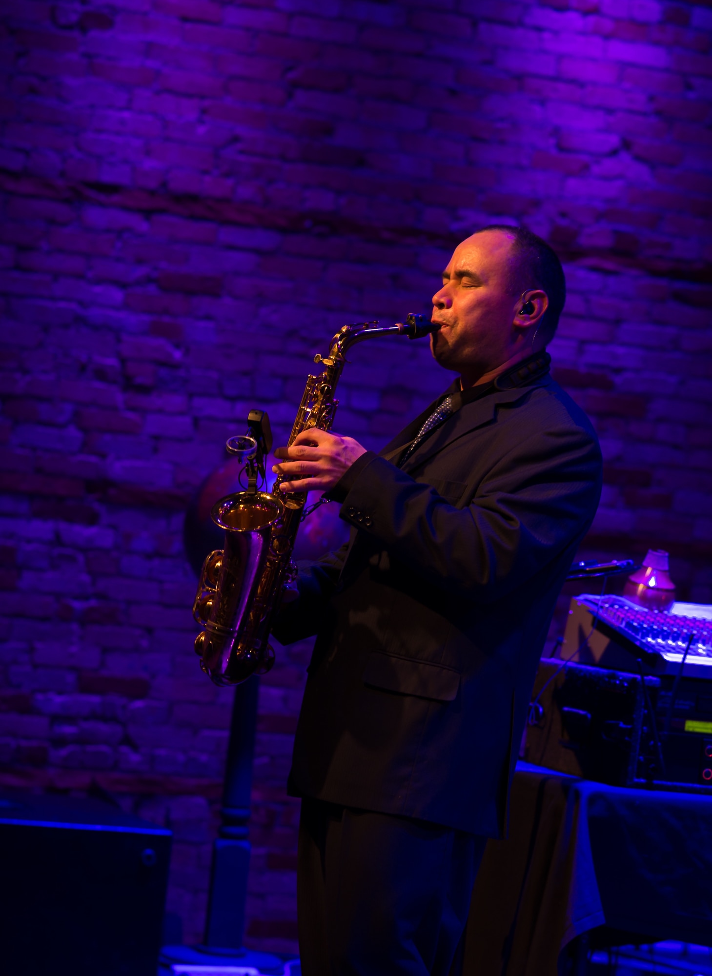 Tech. Sgt. Johnny Holliday plays his saxaphone at a jazz club in St. Paul, Minn. (Courtesy Photo by Angela Ross)