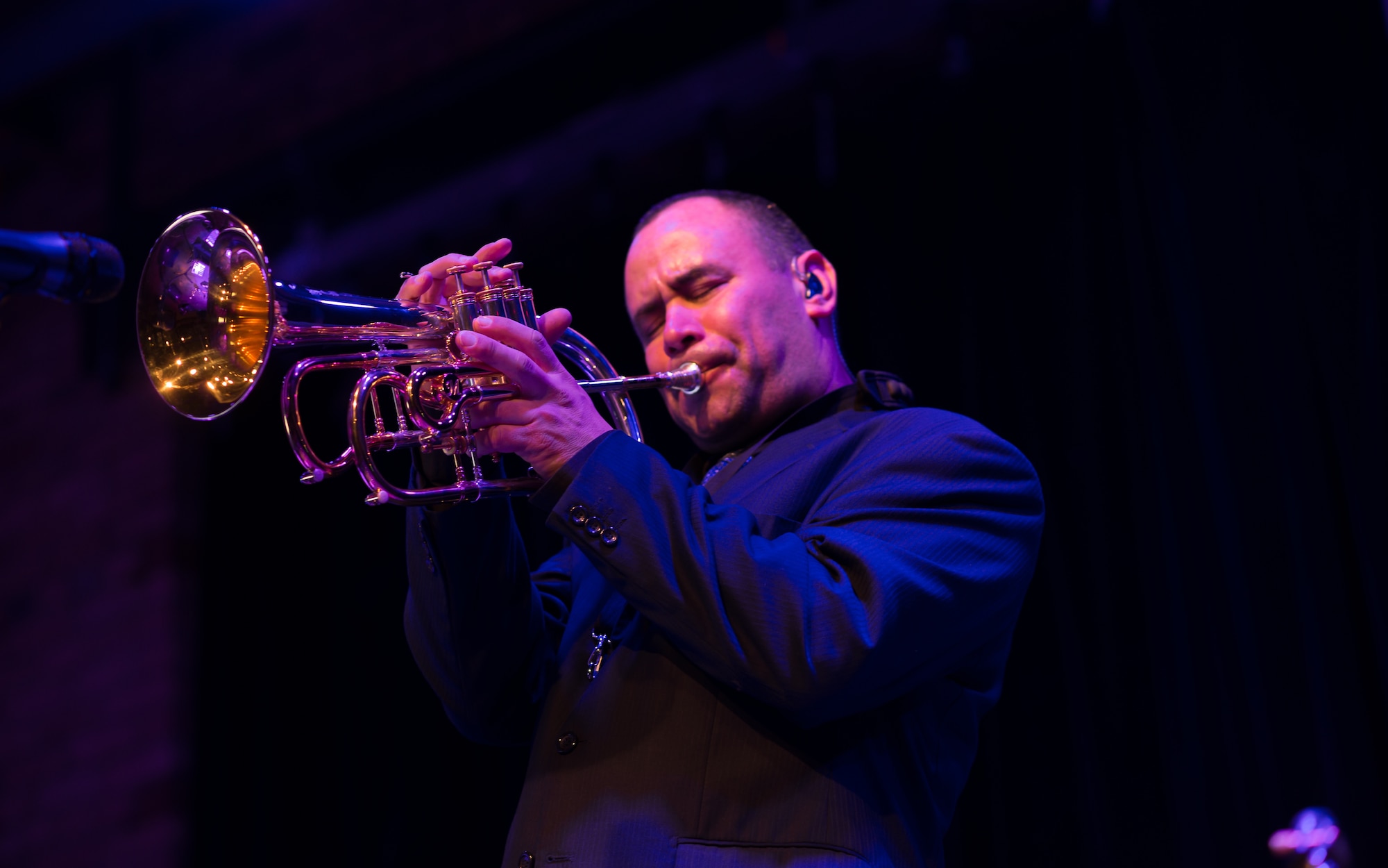 Tech. Sgt. Johnny Holliday plays his flugelhorn at a jazz club in St. Paul, Minn. (Courtesy Photo by Angela Ross)