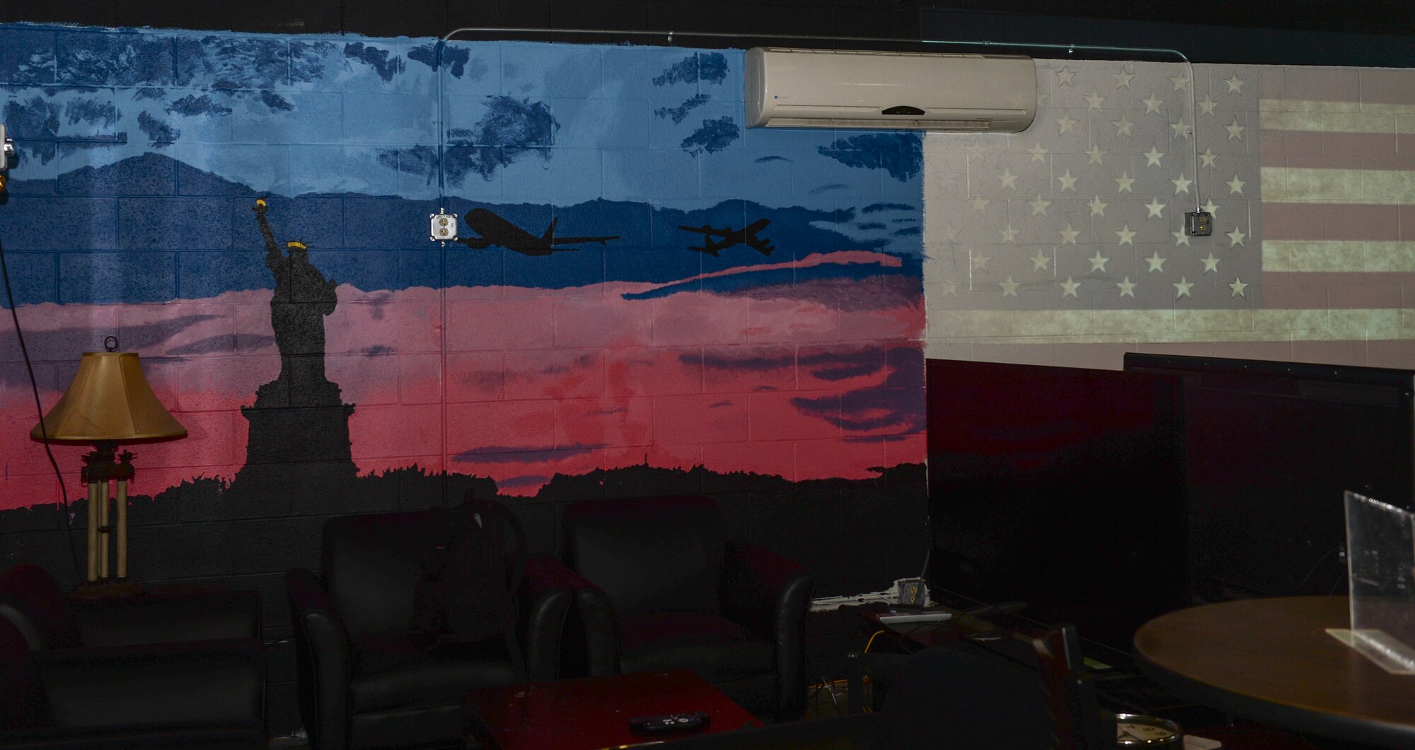 The wall in the Airman Ministry Center, or the “Den” are currently being painted to give the Airmen a more pleasing look. (U.S. Air Force photo/Senior Airman Colby L. Hardin)