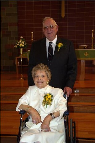 Frank Metzger, a 437th Airlift Wing program analyst, and his late wife, Carolyn, renewed their wedding vows on their 50th anniversary, Oct. 5, 2013, in the same church where they were married. Metzger, who is retiring after 54 years of combined federal service, attributed much of his success to Carolyn. She passed away in 2015. (Courtesy photo)