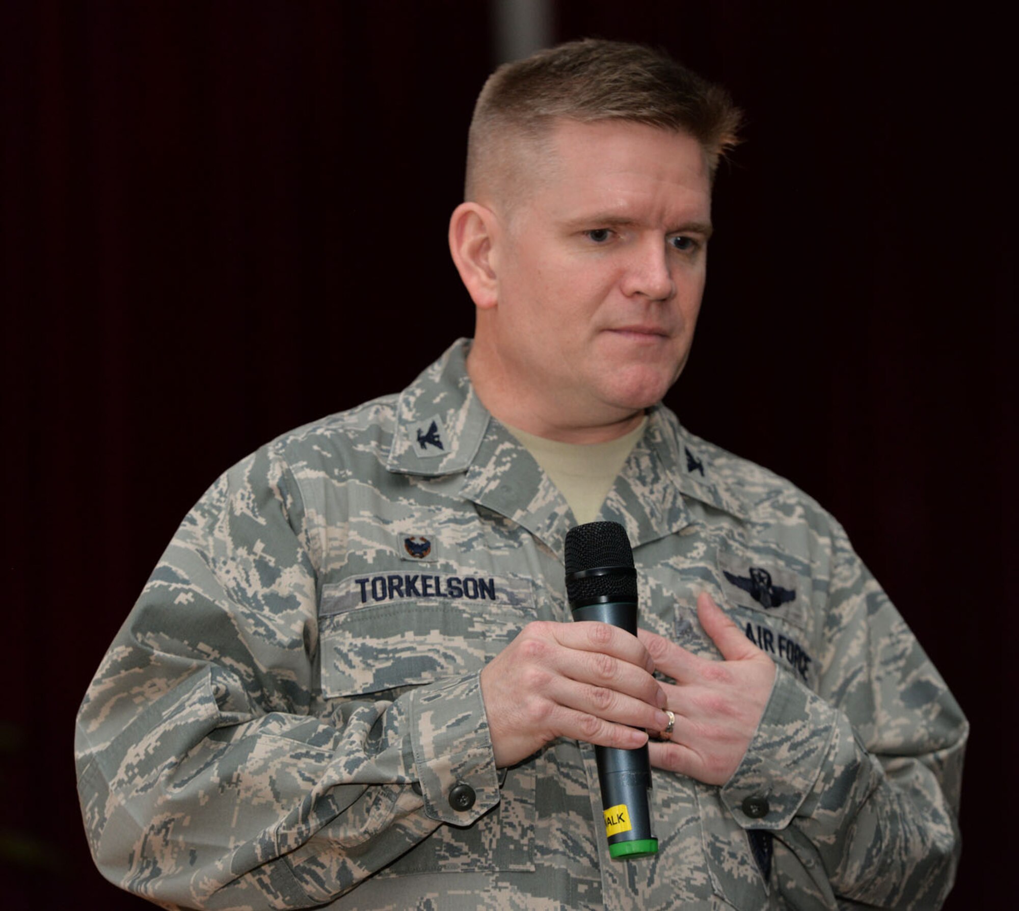 U.S. Air Force Col. Thomas D. Torkelson, 100th Air Refueling Wing commander, shares his personal story of former struggles with alcohol with Team Mildenhall Airmen Feb. 22, 2016, at “Storytellers” on RAF Mildenhall, England. The motto of Storytellers is, “Every Airman has a story,” and the event is an avenue for Airmen to share their stories with others. Torkelson told how his drinking at an early age led to a partying lifestyle before and during his first few years in the Air Force. He said Debbie, his wife, is his rock and stood by him and along with God, they helped turn his life around. The commander shared how he hasn’t had a drink since January 2004. (U.S. Air Force photo by Karen Abeyasekere/Released)