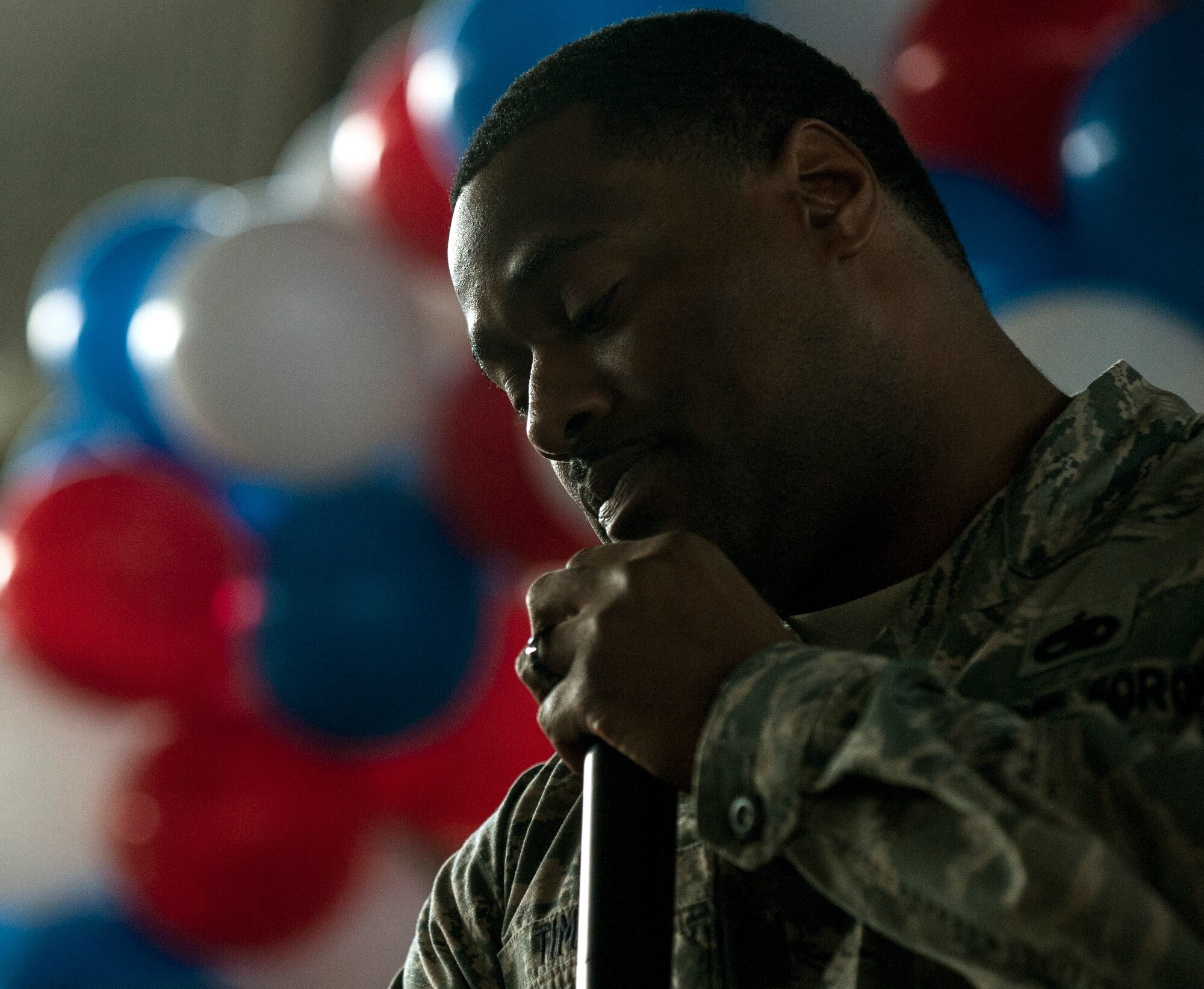 U.S. Air Force Tech. Sgt. Jonathan Timothy, the 2015 Year in Review Pep Rally disc jockey, hypes up the crowd during the event in Hangar 1 at Spangdahlem Air Base, Germany. The event was held in preparation for the 52nd Fighter Wing 2015 Annual Awards Banquet which will be Feb. 26, 2016 at Club Eifel. (U.S. Air Force photo by Senior Airman Rusty Frank/Released)