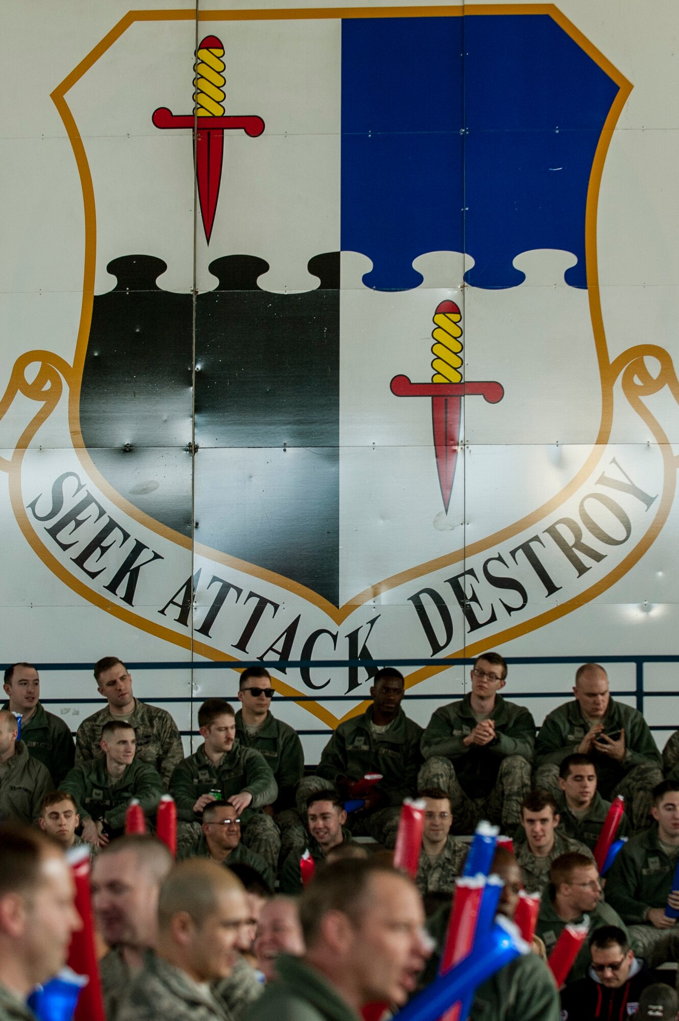 A 52nd Fighter Wing shield is displayed on the door of Hangar 1 during the 2015 Year in Review Pep Rally at Spangdahlem Air Base, Germany, Feb. 25, 2016. The winners will be announced at the 52nd Fighter Wing 2015 Annual Awards Banquet Feb. 26, 2016, at Club Eifel. (U.S. Air Force photo by Senior Airman Rusty Frank/Released)