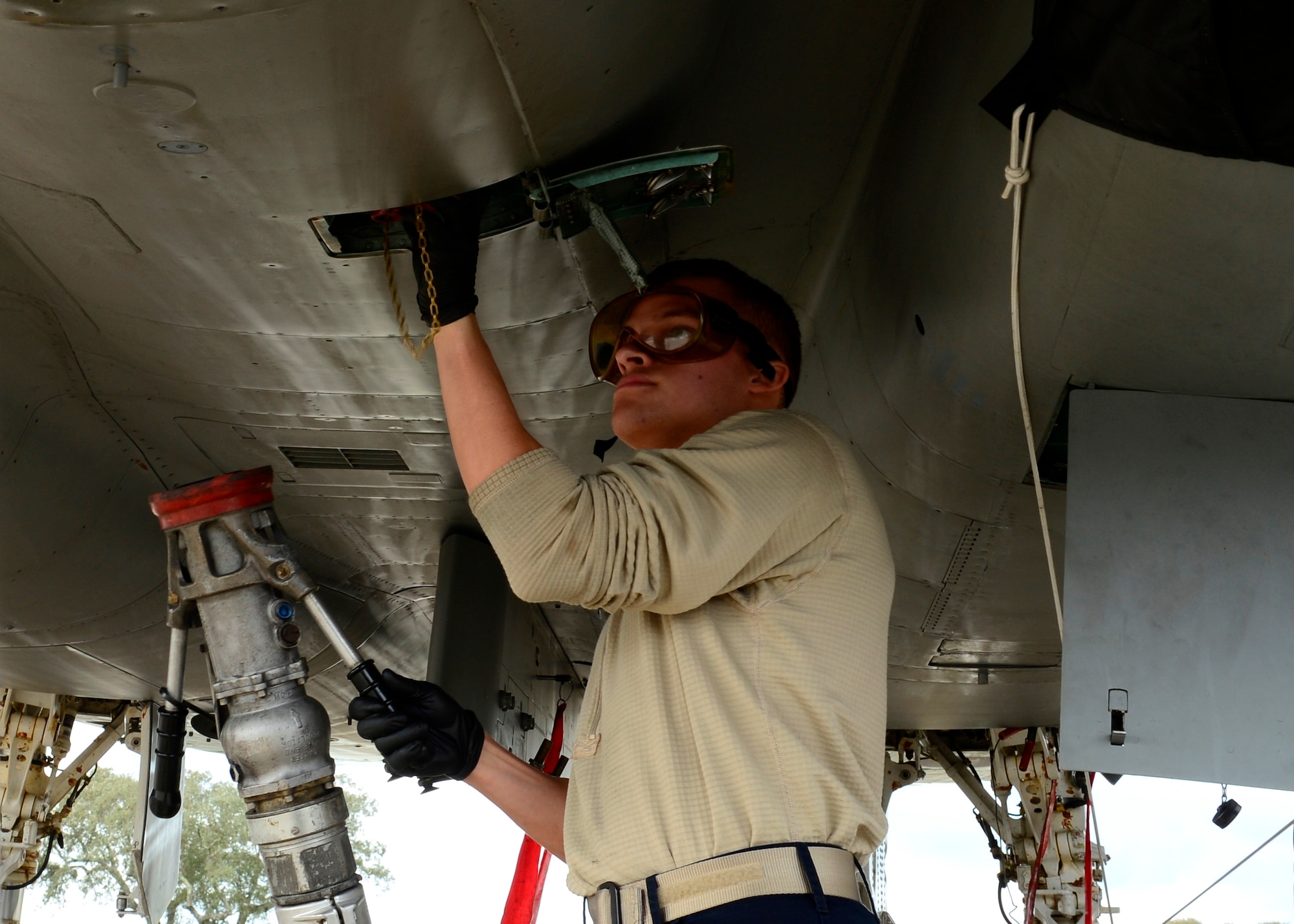 Senior Airman Tristan Gains, 493rd Aircraft Maintenance Unit crew chief prepares to refuel an F-15C Eagle after a flight during exercise Real Thaw at Beja Air Base, Portugal, Feb. 25, 2016. Real Thaw was designed to provide joint interoperability training throughout the execution of a vast range of battlefield missions, facing day and night operations in a high intensity joint setting. (U.S. Air Force photo by Senior Airman Dawn M. Weber/Released)