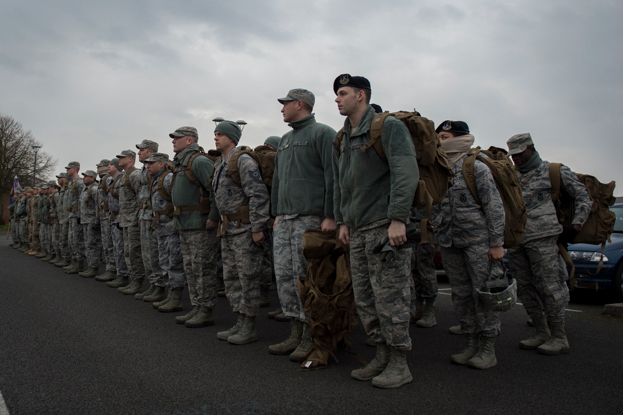 Airmen from the 48th and 100th Security Forces Squadrons, as well as the 48th Communications Squadron participate in a ruck march at Royal Air Force Lakenheath, England, Feb. 25, 2016. The ruck march bolstered camaraderie amongst the participants and physical fitness. (U.S. Air Force photo/Airman 1st Class Erin R. Babis)