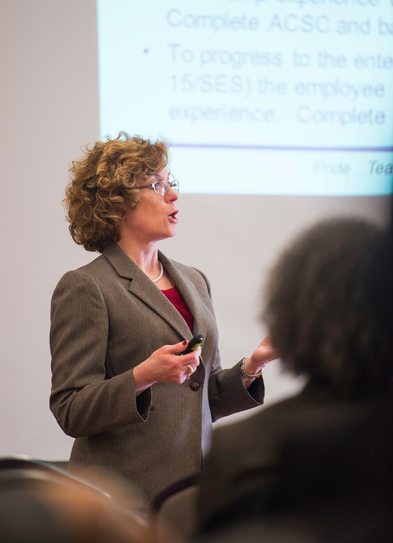 Nancy Zbyszinski, 11th Force Support Squadron manpower and personnel director, briefs Department of Defense civilians within the National Capital Region on civilian force development at Joint Base Andrews, Md., Feb. 26, 2016. The seminar is first of several that is designed to give DOD civilians an opportunity to discuss personal and professional development. (U.S. Air Force by Staff Sgt. Chad C. Strohmeyer/Released)