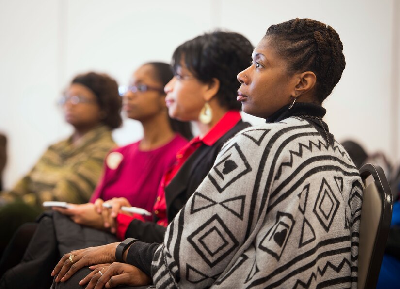 Department of Defense civilians within the National Capital Region listen as Nancy Zbyszinski, 11th Force Support Squadron manpower and personnel director, briefs on civilian force development at Joint Base Andrews, Md., Feb. 26, 2016. The seminar is first of several that is designed to give DOD civilians an opportunity to discuss personal and professional development. (U.S. Air Force by Staff Sgt. Chad C. Strohmeyer/Released)
