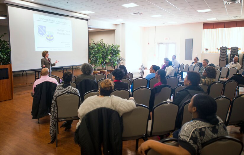 Nancy Zbyszinski, 11th Force Support Squadron manpower and personnel director, briefs Department of Defense civilians within the National Capital Region on civilian force development at Joint Base Andrews, Md., Feb. 26, 2016. The seminar is first of several that is designed to give DOD civilians an opportunity to discuss personal and professional development. (U.S. Air Force by Staff Sgt. Chad C. Strohmeyer/Released)