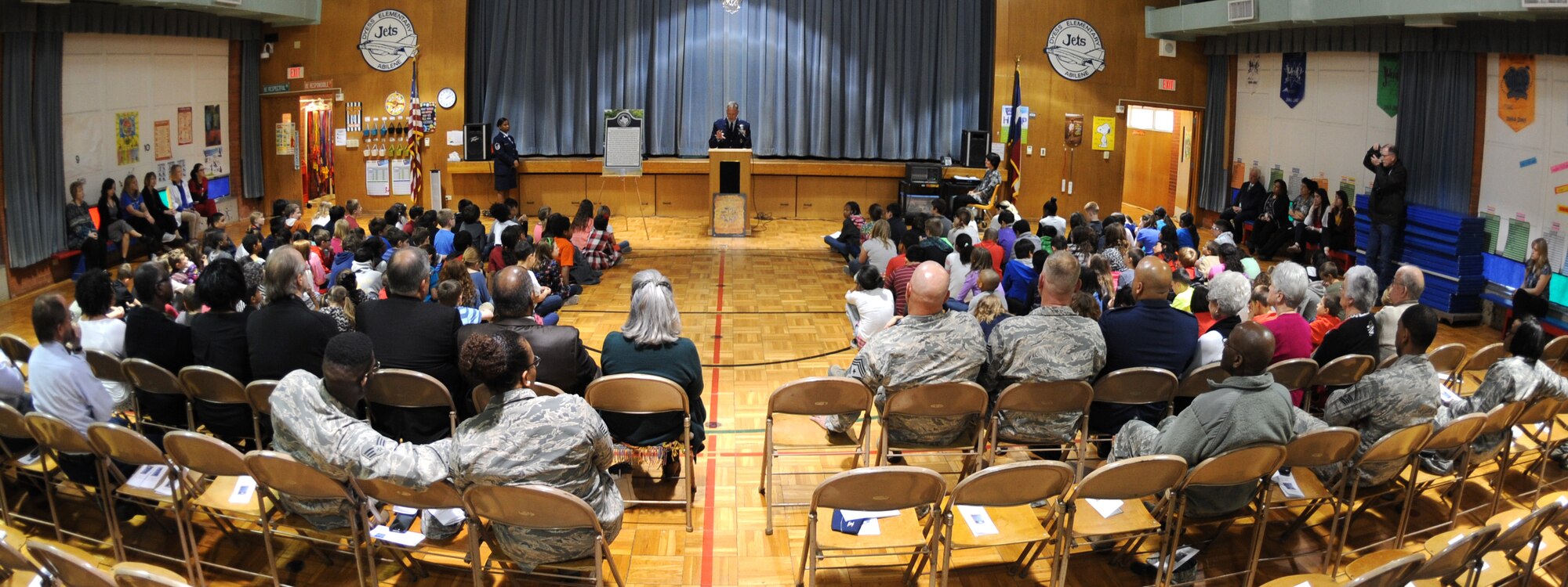 Dyess Elementary students and faculty, parents, local community members and Dyess Airmen attend a ceremony Feb. 22, 2016, at Dyess Elementary in Abilene, Texas. The Dyess African-American Heritage Committee hosted a ceremony to honor Dyess Elementary receiving a Texas Historical Commission Marker for being the first elementary in Abilene Independent School District to become racially integrated. (U.S. Air Force photo by Senior Airman Shannon Hall/Released)