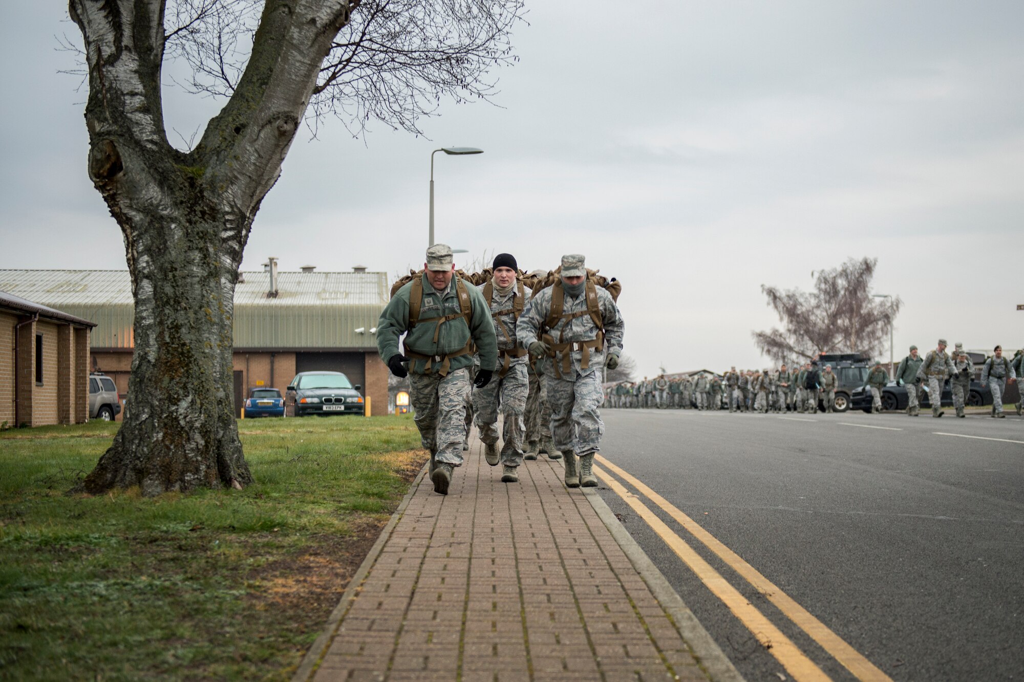 Airmen from the 48th and 100th Security Forces Squadrons, as well as the 48th Communications Squadron participate in a ruck march at Royal Air Force Lakenheath, England, Feb. 25, 2016. The ruck march bolstered camaraderie amongst the participants and physical fitness. (U.S. Air Force photo/Airman 1st Class Erin R. Babis)