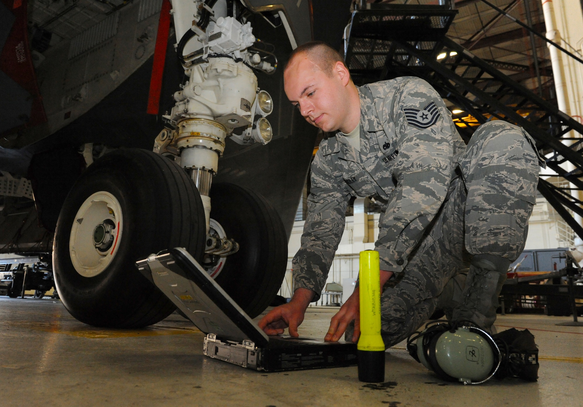 U.S. Air Force Tech Sgt. Aaron Bradley, a 393d Aircraft Maintenance Unit specialist section chief, reviews technical orders prior to maintenance work on a B-2 Spirit at Whiteman Air Force Base, Mo., Feb. 18, 2016. As the specialist section chief, Bradley has oversight of over 80 personnel of the aircraft hydraulics section, propulsion section and electrical and environmental section. Bradley is also responsible for the maintenance of the 4,000 psi hydraulic system which operates the B-2 flight controls, landing gear, brakes, steering and weapon systems.  The maintenance performed by the hydraulics section ensures the B-2 is mission ready. (U.S. Air Force photo by Tech. Sgt. Miguel Lara III)
