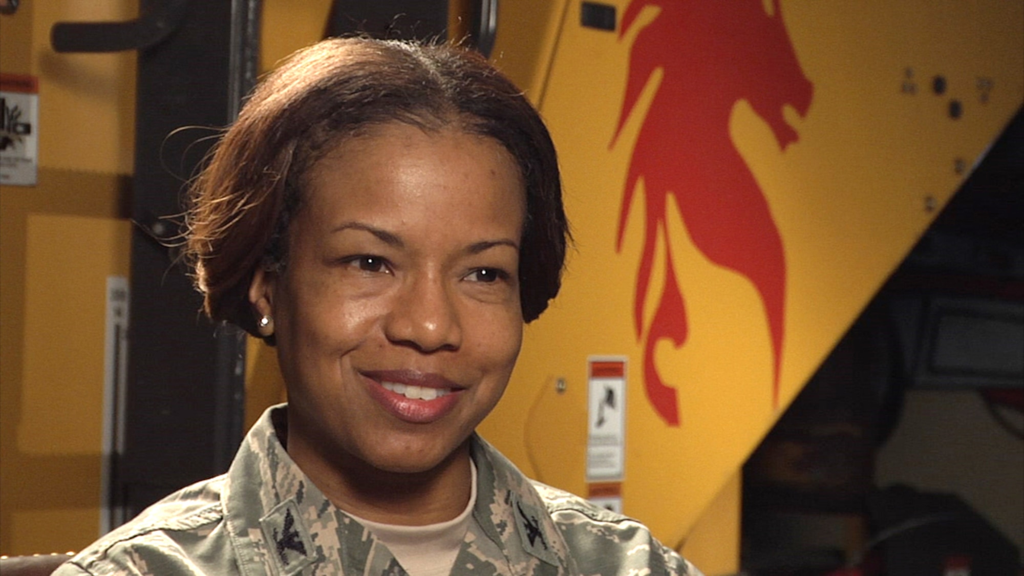 Col. Yvonne Spencer, 819th RED HORSE Squadron commander, sits in an interview Feb. 25, 2016, at Malmstrom Air Force Base, Mont. Spencer is the first African American and first female to lead the 819th RHS. (U.S. Air Force photo/Beau Wade)