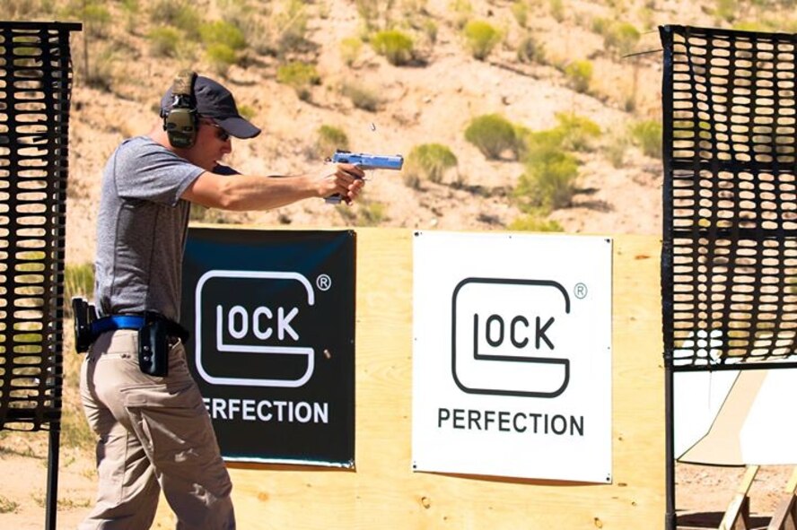 1st Lt. Dalton Bridgers, who is a member of the Air Force Action Shooting Team, participates in a shooting competition. Bridgers will return to the U.S. Air Force Academy campus to help train members of the USAFA Combat Shooting Team, with the aim of helping them apply their skills in the context of competitive shooting. Bridgers is at Kirtland in qualification training for the HH-60G Pave Hawk. Once finished in May, he will be assigned to the 41st Rescue Squadron at Moody Air Force Base, Georgia. (Courtesy photo)
