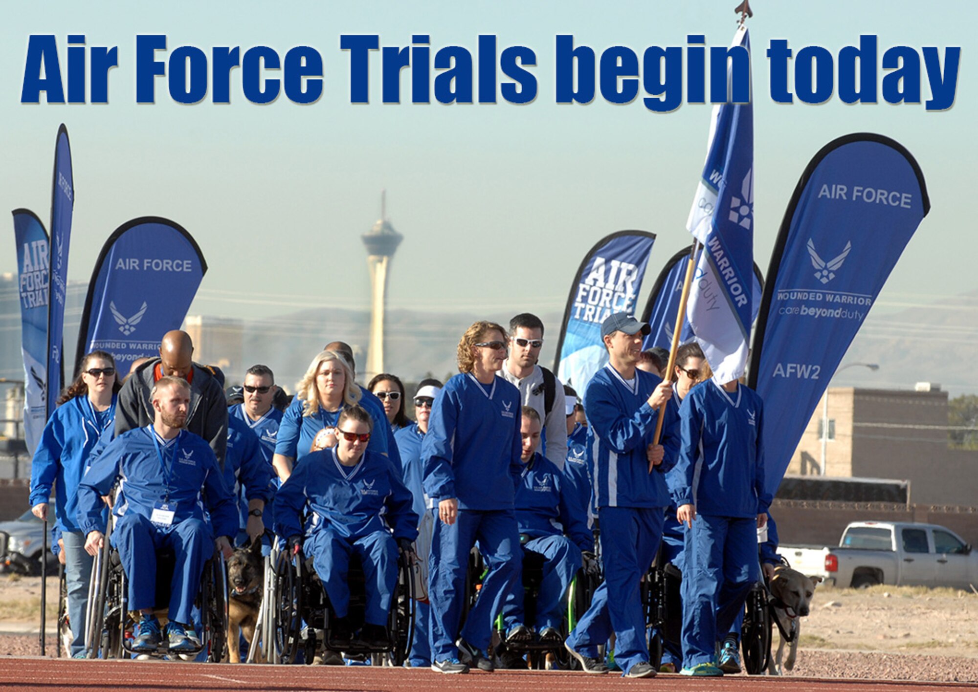 Members of the 2015 U.S. Air Force Wounded Warrior Trials Team walk together during their arrival to the opening ceremony of the Air Force Trials at Nellis Air Force Base, Nev. The 2016 Air Force Trials will be held at Nellis Feb. 26-March 5. More than 100 wounded, ill or injured warriors will compete for the chance to represent the Air Force in the Warrior Games at the U.S. Military Academy at West Point in June. (U.S. Air Force photo by Staff Sgt. Jack Sanders)