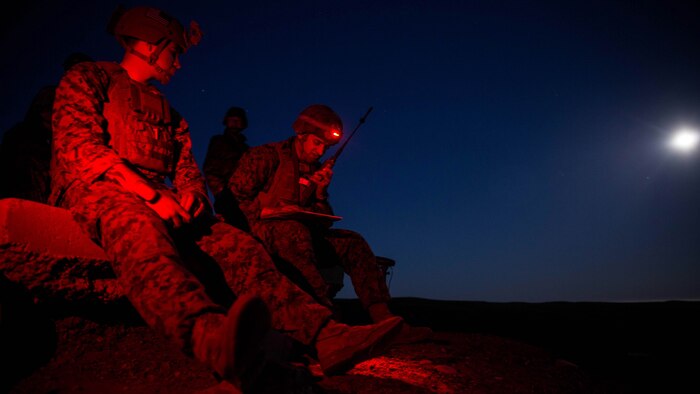 Lance Cpl. Christian Frohlich, a radio operator with 1st Air Naval Gunfire Liasion Company, I Marine Expeditionary Force Headquarters Group, relays coordinates to the objective area of a naval gunfire bombing range on San Clemente Island, Feb. 21, 2016, during the supporting arms coordination center exercise (SACCEX) portion of Exercise Iron Fist 2016. The SACCEX provides U.S. and Japanese forces with hands-on experience in tactics proven to be effective in securing enemy-occupied shorelines during large-scale amphibious assaults. 