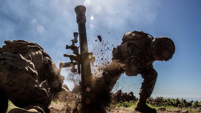 Pfc. Bradley Brandes, a mortarmen with Weapons Company, 1st Battalion, 4th Marine Regiment, fires an 81mm mortar system during the supporting arms coordination exercise (SACCEX) portion of Exercise Iron Fist 2016 on San Clemente Island, Feb. 21, 2016. Iron Fist is an annual, bilateral amphibious training exercise designed to improve U.S. Marine Corps and Japan Ground Self-Defense Force’s ability to plan, communicate and conduct combined amphibious operations at the platoon, company and battalion levels.