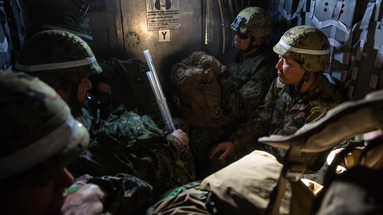 Soldiers with Western Army, Japan Ground Self-Defense Force, await their debarkation of a Landing Craft Air Cushion  onto San Clemente Island, Feb. 21, 2016, as part of the supported arms coordination center exercise(SACCEX) portion of Exercise Iron Fist 2016. Iron Fist is an annual, bilateral amphibious training exercise designed to improve USMC and JGSDF’s ability to plan, communicate and conduct combined amphibious operations at the platoon, company and battalion levels. 