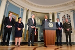 President Barack Obama, at lectern, delivers remarks on the global campaign to defeat with the Islamic State of Iraq and the Levant and other issues while joined by, from left, Brett McGurk, special presidential envoy for the global coalition to counter ISIL; Attorney General Loretta Lynch; Secretary of State John Kerry; Defense Secretary Ash Carter; and Marine Corps Gen. Joseph F. Dunford Jr., chairman of the Joint Chiefs of Staff Joseph Dunford, at the U.S. Department of State in Washington, D.C., Feb. 25, 2016.