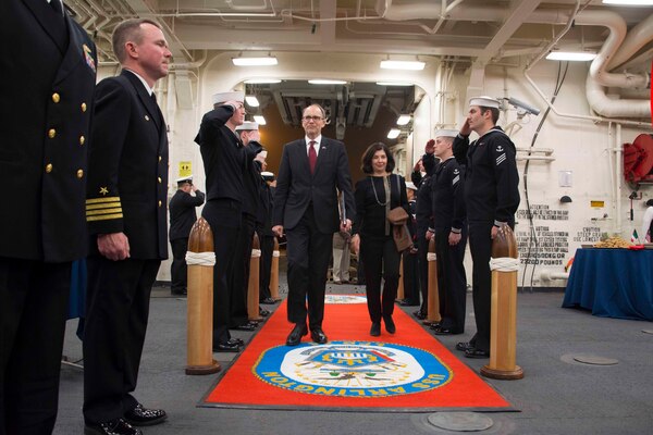 (Feb. 23, 2016) U.S. Ambassador to Kuwait Douglas Silliman and his wife are rendered honors as they arrive aboard the amphibious transport dock ship USS Arlington (LPD 24) during a reception celebrating the 25th anniversary of the liberation of Kuwait. Arlington is part of the Kearsarge Amphibious Ready Group (ARG) and, with the embarked 26th Marine Expeditionary Unit (MEU), is deployed in support of maritime security operations and theater security cooperation efforts in the U.S. 5th Fleet area of operations.