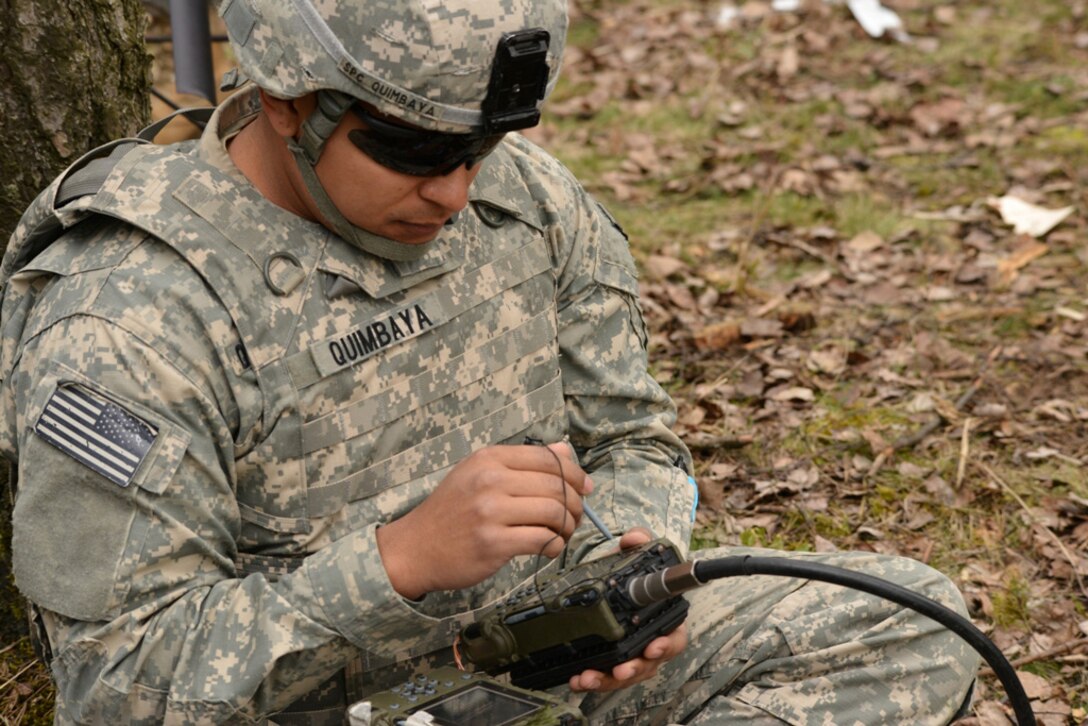 U.S. Army Spc. Christopher Quimbaya, a paratrooper assigned to 1st Battalion, 503rd Infantry Regiment, 173rd Infantry Brigade Combat Team, Airborne, uses a Defense Advanced GPS receiver during a combined-arms live-fire exercise at Grafenwoehr, Germany, March 28, 2014. U.S. Army photo by Visual Information Specialist Markus Rauchenberger