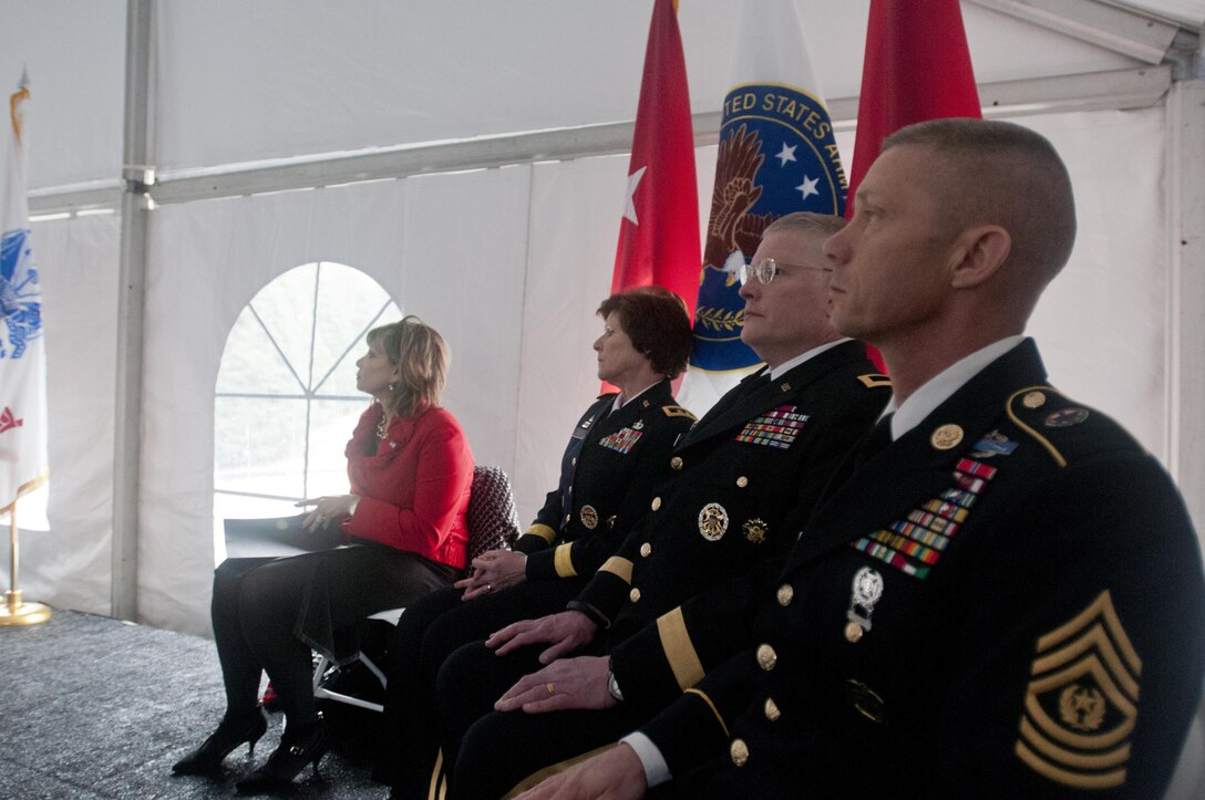 The official party of the 25th memorial service for the 14th Quartermaster Detachment, from the left, Councilwoman Kathleen McCormick, from the city of Greensburg, Pa., Maj. Gen. Margaret W. Boor, commanding general of the 99th Regional Support Command, Brig. Gen. Richard C. Staats, commanding general of the 316th Sustainment Command (Expeditionary), and Command Sgt. Maj. Johnny McPeek, command sergeant major of the 316th, observe the service in Greensburg, Pa. Feb. 25, 2016. (U.S. Army photo by Staff Sgt. Dalton Smith/Released)