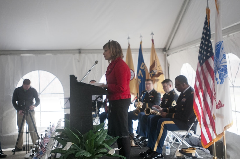 Councilwoman Kathleen McCormick, from the city of Greensburg, Pa., addresses assembled family members and Soldiers of the 14th Quartermaster Detachment, based in Greensburg, Feb. 25, 2016. The memorial was for the 25th anniversary of the scud missile attack on the 14th Quartermaster Detachment during Operation Desert Storm. (U.S. Army photo by Staff Sgt. Dalton Smith/Released)