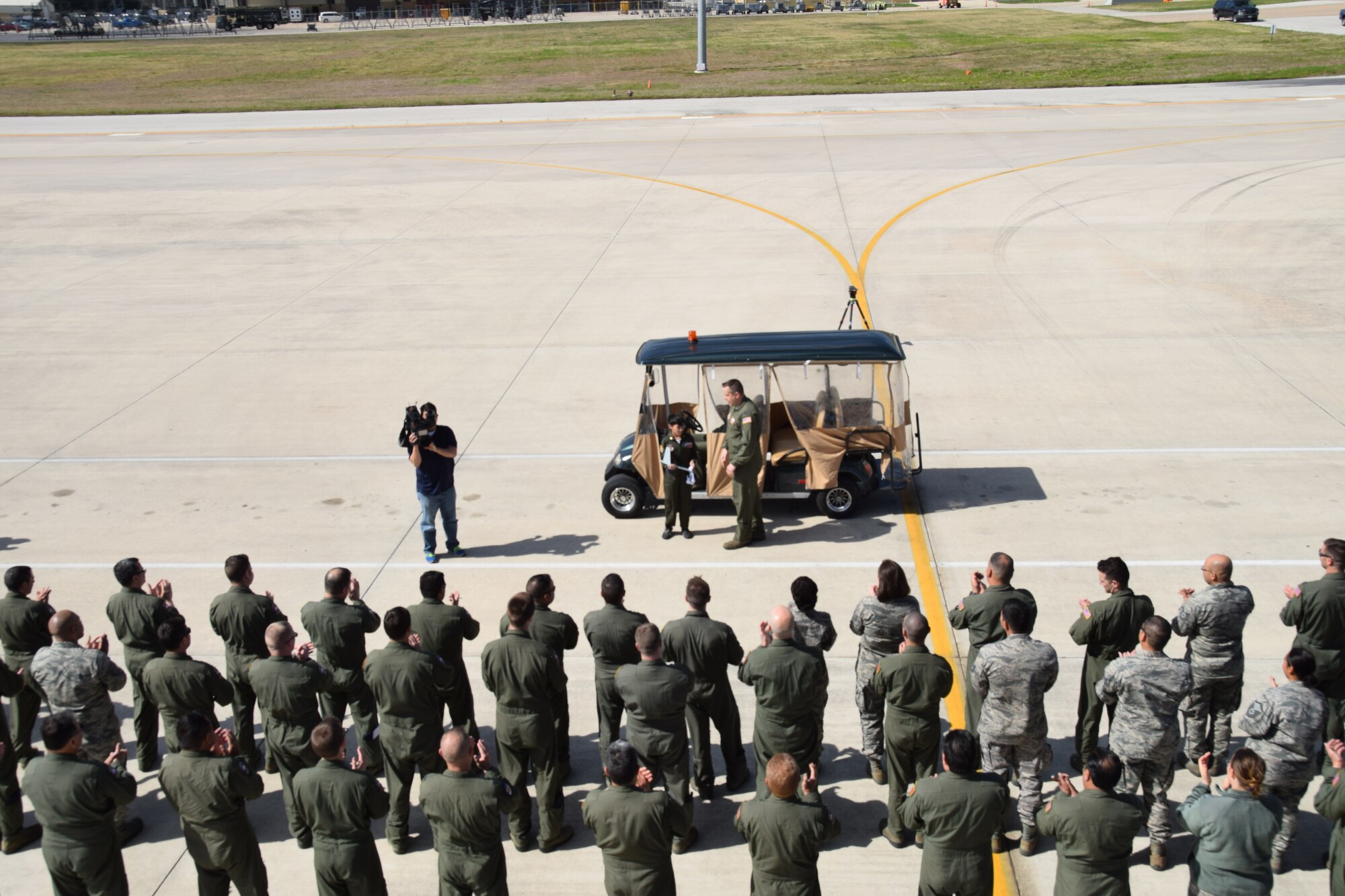 Escorted by Maj. Chris Melton (right), a pilot and 68th Aerial Squadron Director of Operations, Feb. 28, 2016, Zach Gutierrez, the 433rd Airlift Wing’s Pilot for a Day, meets Alamo Wing members on the flight line before touring the C-5A Galaxy aircraft.  The program’s goal is to give each child a special day as an honorary pilot and a break from the challenges they face.  (U.S. Air Force photo by Tech. Sgt. Carlos J. Trevino)